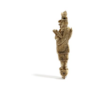 A NAPOLEONIC FRENCH PRISONER OF WAR CARVED BONE FOLDING PIPE CLEANER EARLY 19TH CENTURY in the form of a soldier with a Punch