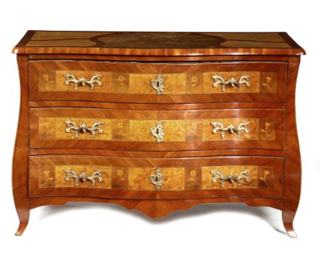 A CONTINENTAL CHERRYWOOD WALNUT AND BIRD'S EYE MAPLE BOMBE COMMODE PROBABLY NORTH EUROPEAN, 19TH CENTURY inlaid with fruitwoo