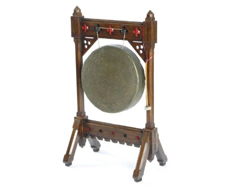 A LATE VICTORIAN OAK AND BRONZE GONG c.1880 in Gothic style, with a beater 108.4cm high, 63cm wide, 40cm deep