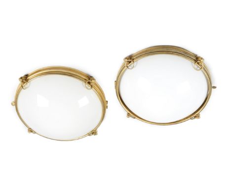 A PAIR OF GILT BRASS AND OPAQUE GLASS PLAFONNIERS IN REGENCY STYLE 20TH CENTURY decorated with lion's masks, one with twin-li