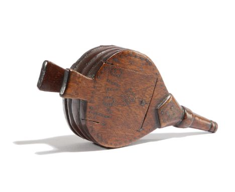 A TREEN SNUFF BOX IN THE FORM OF A PAIR OF BELLOWS 19TH CENTURY with brass tack decoration, the sliding cover inscribed 'Love