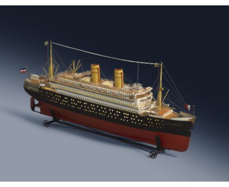 A RARE GERMAN TINPLATE DISPLAY-MODEL OF AN OCEAN LINER BY MARKLIN c.1912-18 of a twin-funnel liner titled 'Columbus', with a 