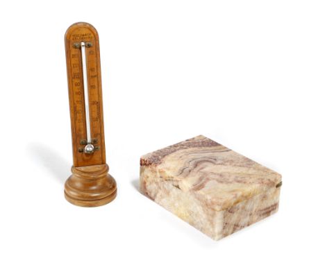 AN ONYX CIGARETTE BOX EARLY 20TH CENTURY the brass hinge stamped 'Made In England', together with a desk thermometer by Field
