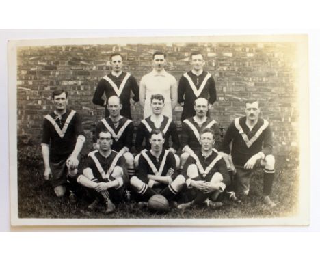 Grantham Football Club rare postcard of team taken 16/06/1926 showing them in kit with large v. The card was produced by Walt