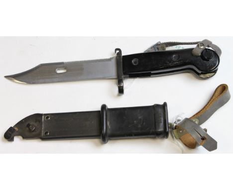 Bayonet: An AKM bayonet in vgc in its plastic scabbard. Blade 6" in mint condition. 