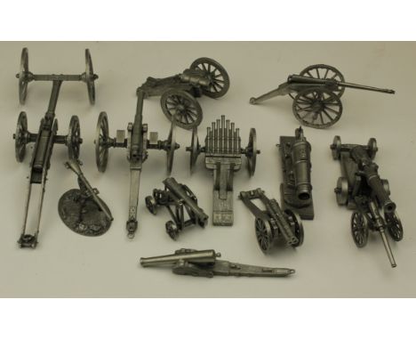 A collection of pewter (?) models of many different types of 19th century cannon. These are finely detailed and well made and