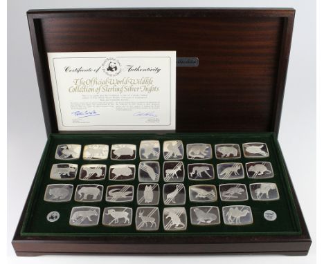 WWF (World Wildlife Fund) Silver Ingot set, a thirty piece set housed in a wooden box with paperwork, aFDC with some light sp