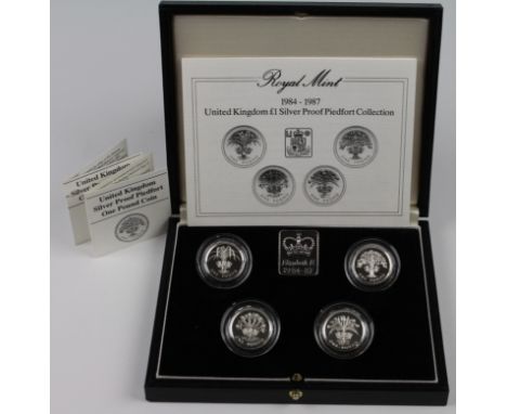 Royal Mint 1984-1987 United Kingdom £1 Silver Proof Piedfort Collection (4 coins) aFDC cased with a few certs, some light ton