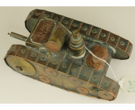 An outstanding & well made trench art model of a WW1 Tank made into an oil lamp. Construction of copper and brass. Copper pla