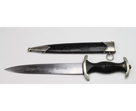 German Nazi SS dagger with scabbard (lacking Eagle to grip), blade maker marked 'Carl Julis Krebs Solingen'. 