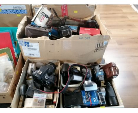 3 boxes of vintage camera equipment including folding cameras, lenses, lens covers, filters etc.