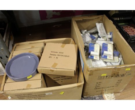 2 boxes of ceramic trays for candles and box of two-way telephone adapters 