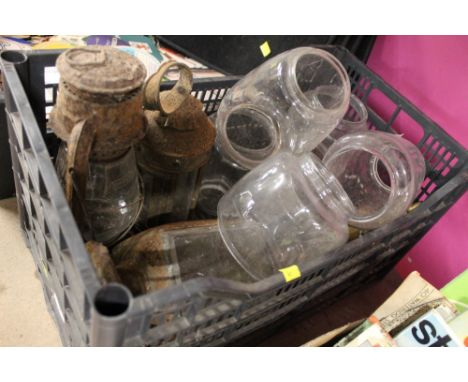 Glass storm lanterns and glass lantern shades
