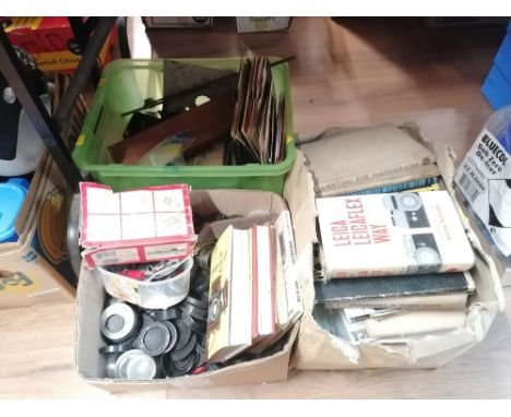 3 boxes of vintage camera, books, magazines, lens caps and vinyl singles