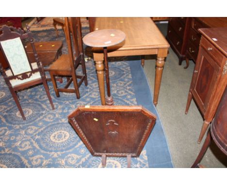 Tall wooden stand with pedestal legs and fire screen