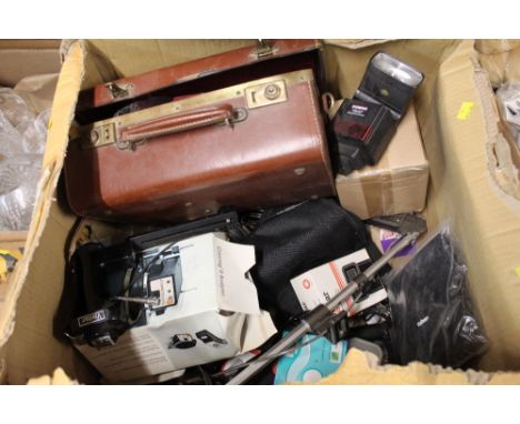 Box of vintage camera equipment including leather case, flash guns, etc