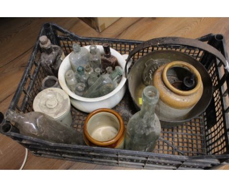 Collection of vintage glass bottles, stoneware jars and a brass jampan