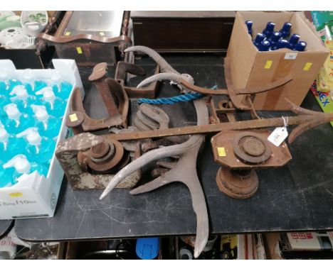 Iron boot-pull, scales, antler