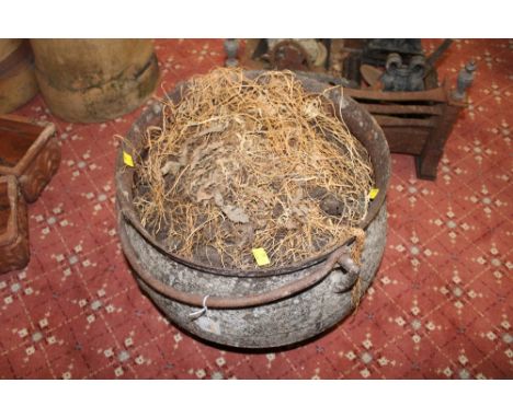 Vintage iron cauldron on feet, formerly used as a garden planter or decoration, max height 35 cm x 40 cm x 40 cm