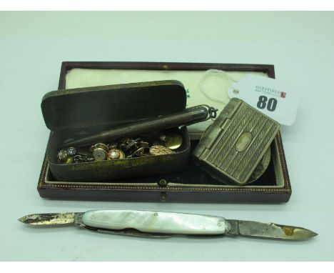 Gent's Cufflinks and Assorted Dress Studs, contained in a vintage tobacco tin, a vesta case with stamp compartment, modelled 