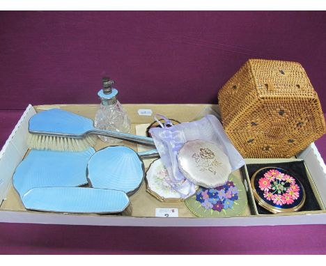 A Pale Blue Enamel Backed Part Dressing Table Set, including scent bottle and powder bowl lid (no base); assorted powder comp