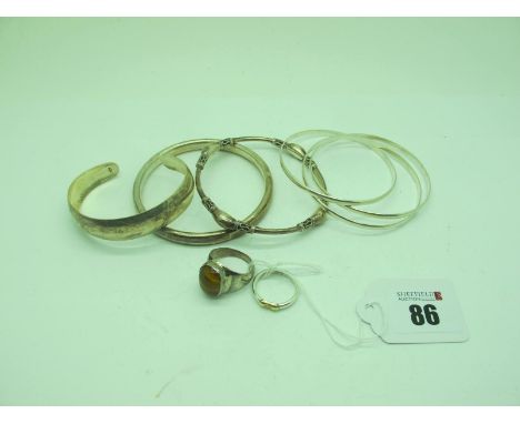 TD.77 Mexico "925" Bangle, of plain design, an open bangle, stamped "925"; a decorative bangle, a tiger's eye single stone ri