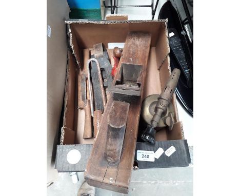A box containing vintage wooden plane/ blowtorch 