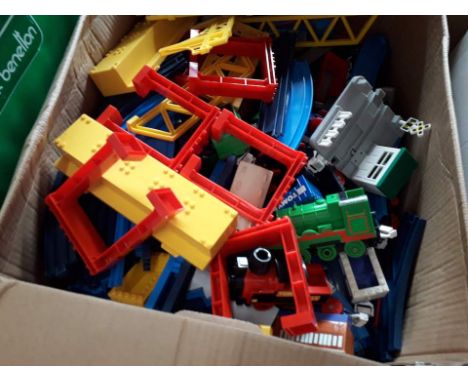 A box of Thomas the Tank Engine engines and track 