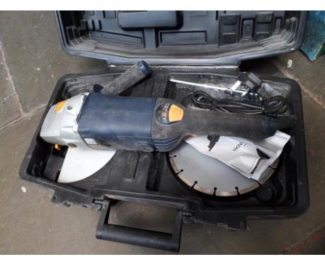An angle grinder with diamond tipped blade 