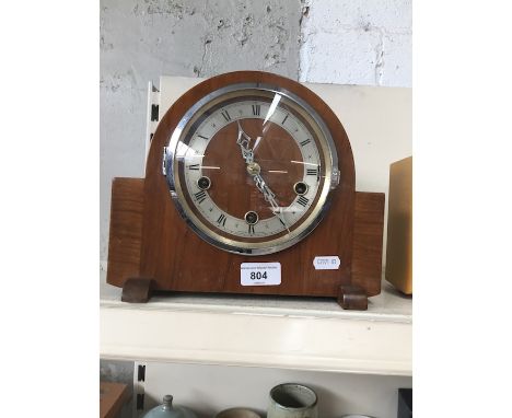 A mantel clock with Westminster chime 