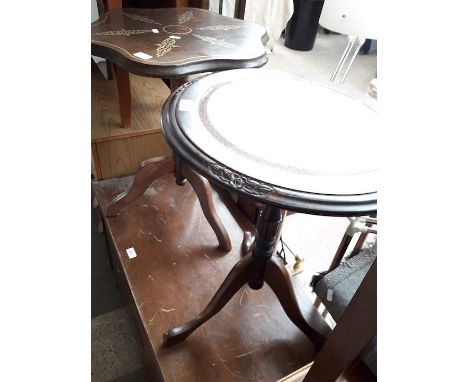 Two tripod tables 