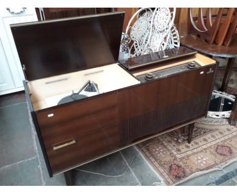 A vintage Grundig radiogram in cabinet with turntable 