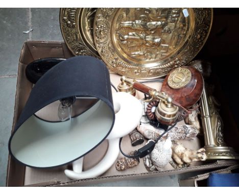 A box of misc to include 2 large brass chargers, vintage style telephone, ornaments, lamp, etc 