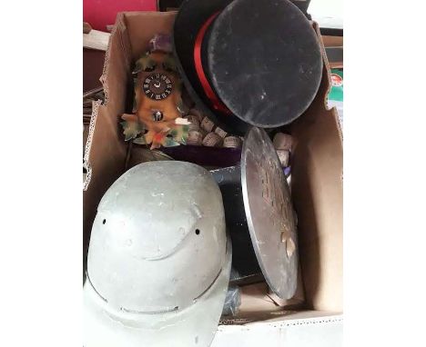 A box of misc to include top hat, binoculars, vintage helmet, hotel plaque, etc 