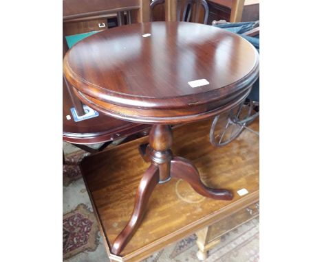 A mahogany tripod table 