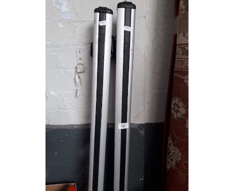 A misc lot containing a roof cross bars and fittings for Toyota RAV4 or Corolla Verso, a warning triangle and engine oil in c