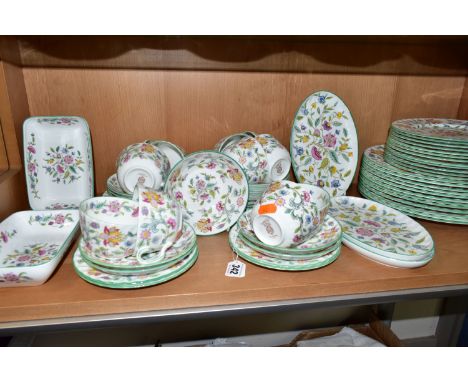 A SIXTY FOUR PIECE MINTON HADDON HALL DINNER SERVICE, comprising three oval serving plates (one with small chip), two rectang