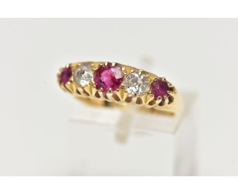 AN EARLY 20TH CENTURY 18CT GOLD, RUBY AND DIAMOND RING, designed with three circular cut rubies, interspaced with two old cut