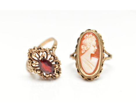 TWO 9CT GOLD RINGS, the first a marquise cut garnet set within an open work beaded mount with a high open work gallery, hallm