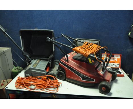 A MOUNTFIELD PRINCESS 84401 LAWN MOWER with grass box along with a Black and Decker GD200 lawnraker (both PAT pass and workin