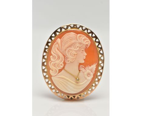 A 9CT GOLD HABILLE CAMEO BROOCH, carved oval shell cameo, depicting a lady in profile, dressed with a single cut diamond pend