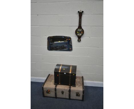 A VINTAGE CANVASS TRAVELINNG TRUNK, along with an modern hinged chest, a frameless wall mirror, and a barometer (4)