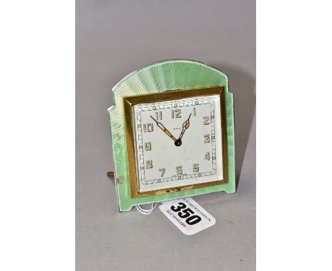AN ART DECO SMITHS DESK CLOCK, in a shaped pale green guilloche enamel surround, the square dial printed with Arabic numerals