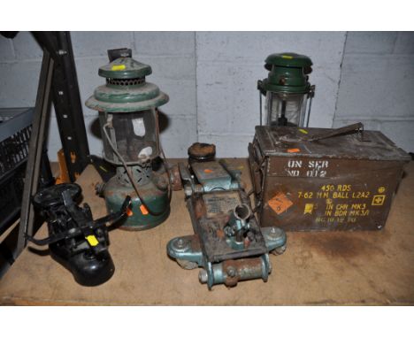 A VINTAGE MILITARY CASE ,along with two vintage paraffin lamps, a set of vintage black scales, a single axle stand and a 1.5 
