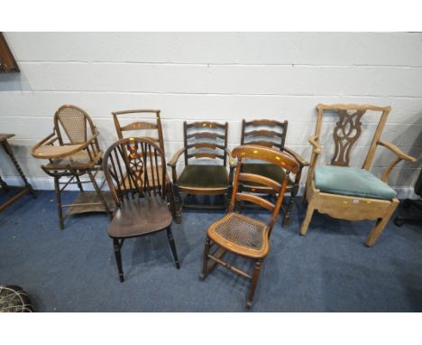 A SELECTION OF VARIOUS PERIOD CHAIRS, to include a slightly distressed commode, two oak carvers, a cane seated rocking chair,