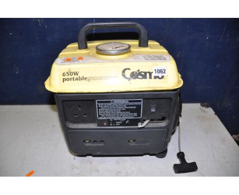 A COSMO 650W PORTABLE GENERATOR (UNTESTED but engine pulling freely)