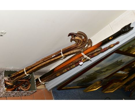 FIFTEEN ASSORTED WOODEN WALKING STICKS, to include thorn wood examples, together with one box of ferrules and wooden walking 