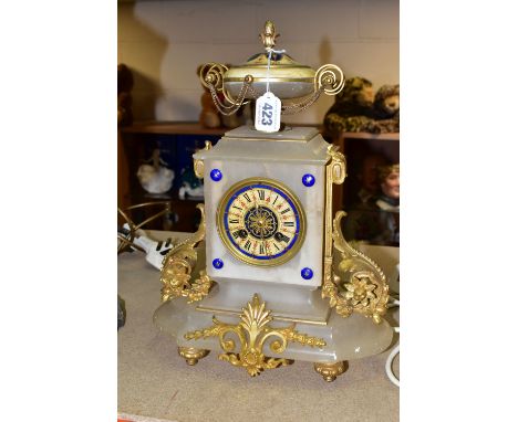 A FRENCH MANTEL CLOCK, white onyx body with foliate gilt decoration, hand painted face with a blue border, foliate design and