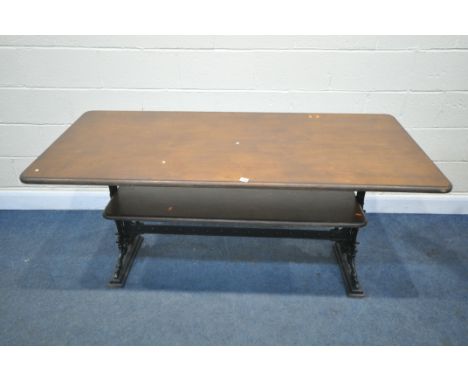 A VINTAGE MITCHELLS AND BUTLERS LTD RECTANGULAR CAST IRON TABLE, with later wooden top and undershelf, length 169cm x depth 7