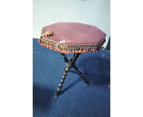 A 19TH CENTURY EBONISED OCTAGONAL GYPSY TABLE, on bobbin turned leg, 48cm x height 64cm (condition:-ribbon edge partially dam